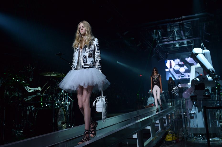Courtney Love sang at German designer Philipp Plein's show, and the catwalk was surrounded by flying drones, and head-banging robots playing drums and guitar. 
