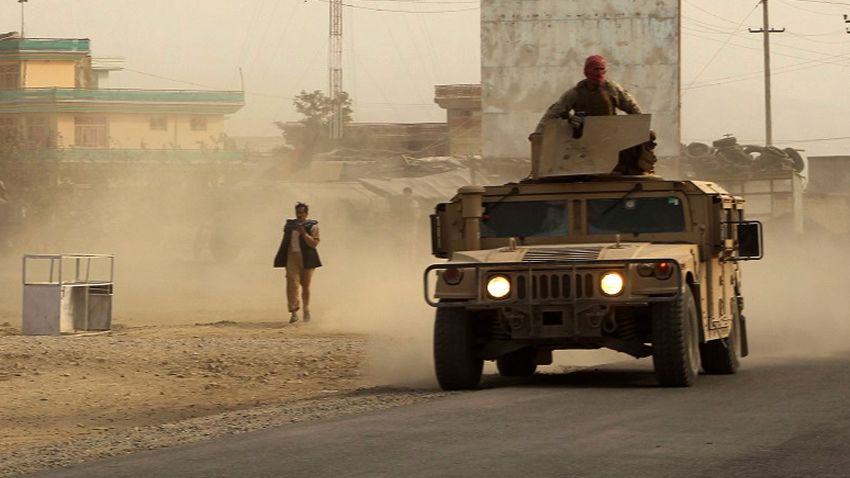 Afghan security forces travel in a Humvee vehicle, as battles were ongoing between Taliban militants and Afghan security forces, in Kunduz, capital of northeastern Kunduz province on September 28, 2015.  The Taliban are in control of around half of Kunduz, Afghanistan's fifth largest city, a senior police official said September 28.  Sayed Sarwar Hussaini, police spokesman for the northeastern Kunduz province, told a news conference: "Around half the city has fallen into the hands of Taliban insurgents."  AFP PHOTO / Najim RahimNAJIM RAHIM/AFP/Getty Images