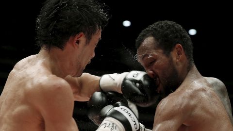 WBC bantamweight champion Shinsuke Yamanaka punches Anselmo Moreno during a title bout in Tokyo on Tuesday, September 22. Yamanaka won by split decision.