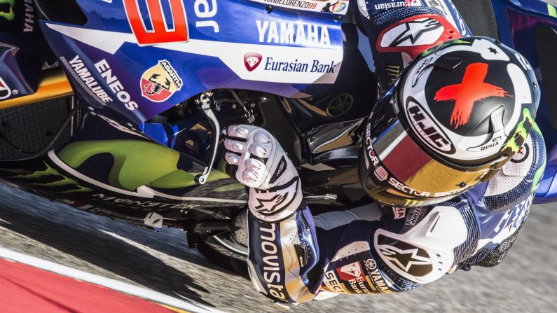 MotoGP rider Jorge Lorenzo leans into a turn during a practice run Friday, September 25, in Alcaniz, Spain. Lorenzo won the race there two days later and moved 14 points behind Valentino Rossi in the overall standings.