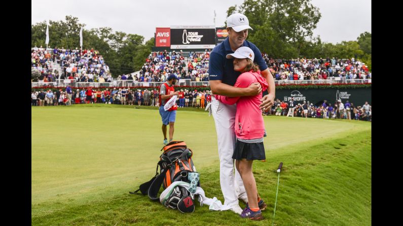 Jordan Spieth hugs his sister, Ellie, after he won the Tour Championship and the FedEx Cup on Sunday, September 27. It capped off <a href="index.php?page=&url=http%3A%2F%2Fwww.cnn.com%2F2015%2F09%2F28%2Fgolf%2Fjordan-spieth-record-winnings%2Findex.html" target="_blank">a spectacular season</a> for the 22-year-old, who won two major tournaments and earned a record $22 million.