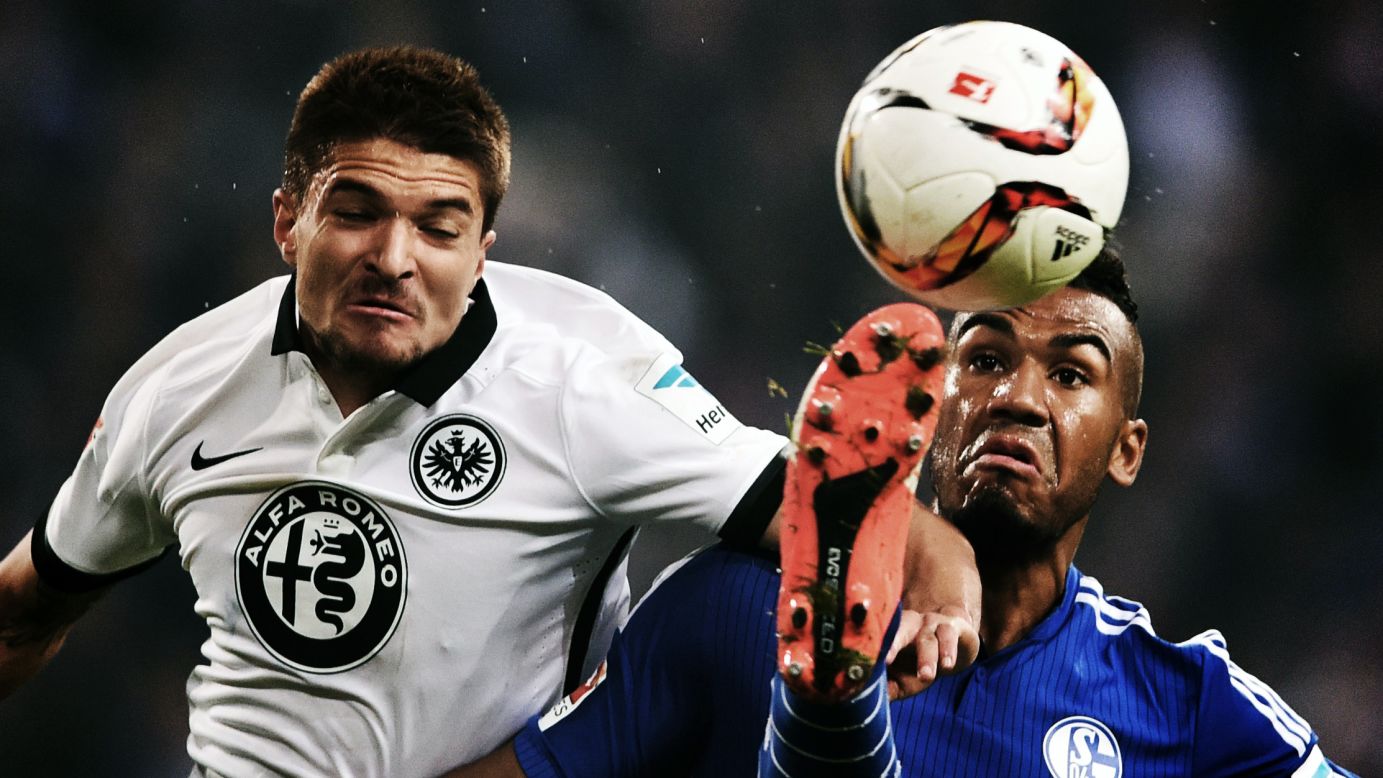 Eintracht Frankfurt's Aleksandar Ignjovski, left, challenges Schalke's Eric Maxim Choupo-Moting during a Bundesliga match in Gelsenkirchen, Germany, on Wednesday, September 23. 