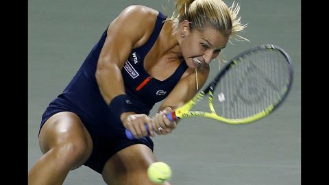 Dominika Cibulkova returns a shot while playing in the Pan Pacific Open in Tokyo on Tuesday, September 22.