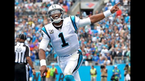 Carolina quarterback Cam Newton celebrates after throwing a touchdown pass against New Orleans on Sunday, September 27. Newton and the Panthers won 27-22, improving their record to 3-0.