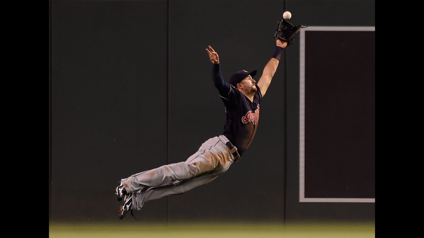Cleveland's Lonnie Chisenhall misses a catch during a game in Minneapolis on Thursday, September 24.