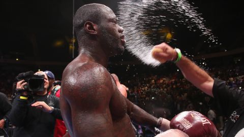 Deontay Wilder's corner throws water onto his face after his bout against Johann Duhaupas on Saturday, September 26. Wilder, the WBC's heavyweight champion, defended his belt with an 11th-round stoppage.