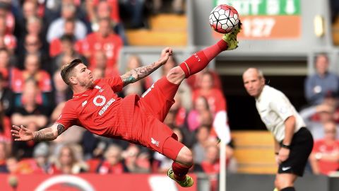 Liverpool fullback Alberto Moreno stretches for a ball during a Premier League match in Liverpool, England, on Saturday, September 26.