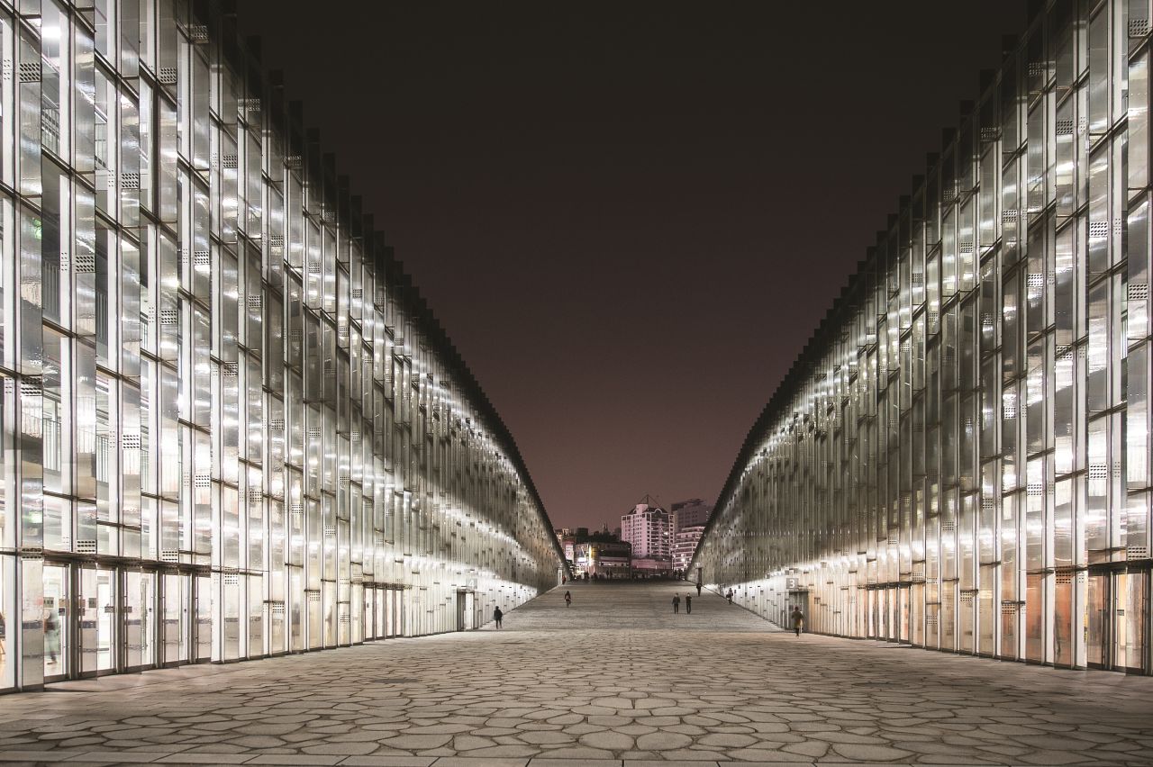 The EWHA Womens University in Seoul, South Korea. One of Dominique Perrault's key aims as an architect is to bring harmony to the relationship between buildings and their surroundings.