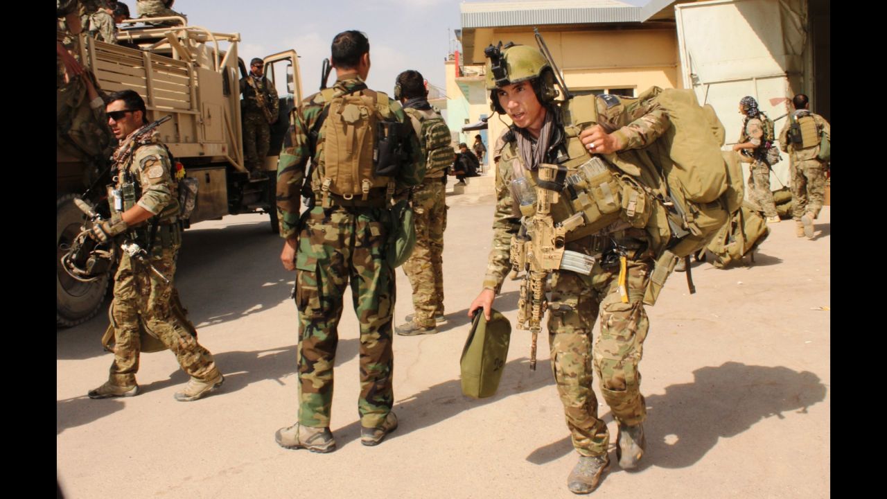 Afghan special forces prepare to launch an operation to retake the city of Kunduz, Afghanistan, from Taliban insurgents on Tuesday, September 29. The Taliban took control of most of the city the day before in its biggest victory since 2001.