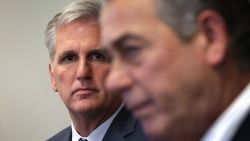 U.S House Majority Leader Rep. Kevin McCarthy (R-CA) (L) listens as Speaker of the House Rep. John Boehner (R-OH) (R) speaks to member of the media after a House Republican Conference meeting September 29, 2015 at the U.S. Capitol in Washington, D.C.
