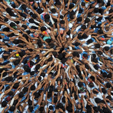Photojournalist <a href="https://instagram.com/ashish_vj/" target="_blank" target="_blank">Ashish Vaishnav</a> shot this incredible image of Dahi Handi, a Hindu festival where people make a human pyramid to break a pot of curd at a certain height. It is based on a legend of the child god Krishna stealing butter.<br /><br />Silk Road TV presenter Sumnima Udas: "As soon as I saw the picture I thought -- this is India. A sea of people, pushing, rushing, striving to meet a goal. The fact that you can't see the earthen pot full of curd makes this photo even more interesting. <br /><br />"I've been to many such celebrations before, and it's not easy to take a photo that so perfectly captures the energy, color and vibrancy of India." 