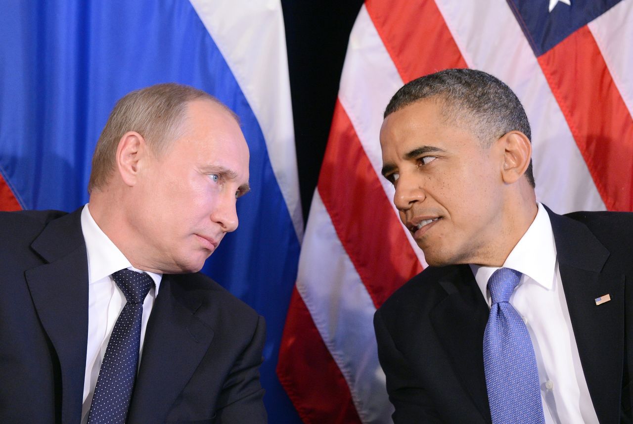 Obama listens to Putin after their bilateral meeting in Los Cabos, Mexico on June 18, 2012 on the sidelines of the G-20 summit. The meeting was the first time Obama and Putin held face-to-face talks since Putin returned to the president's office earlier that year.  Obama said he and Putin discussed the conflict in Syria and "agreed that we need to see a cessation of the violence, that a political process has to be created to prevent civil war."
