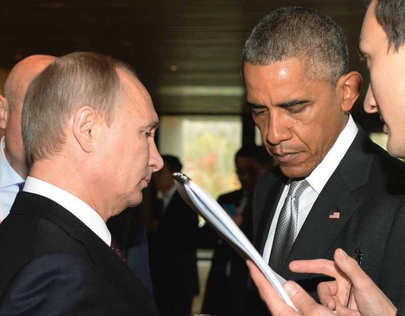 Putin speaks with Obama during the Asia-Pacific Economic Cooperation summit in Beijing, China on November 11, 2014. U.S.-Russia relations have descended to a new low since Russia annexed Crimea in March. 
