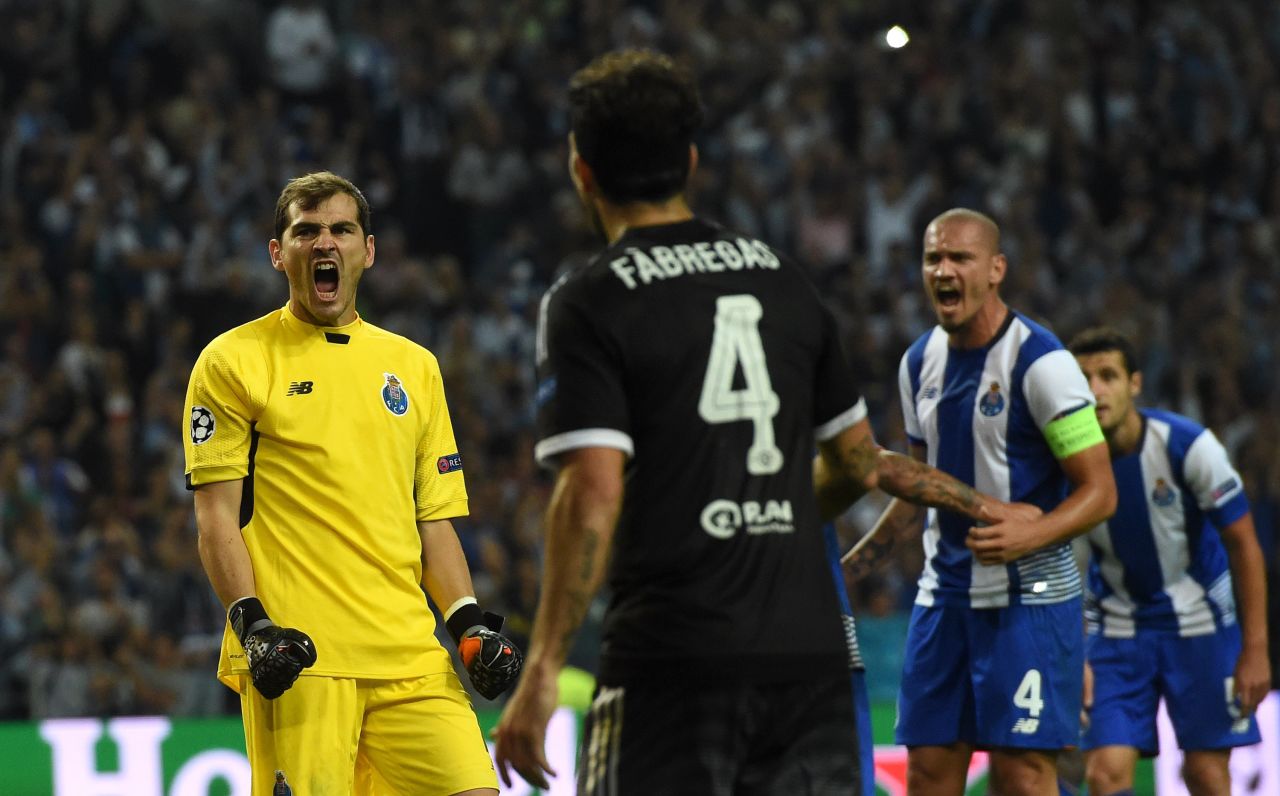 Porto's former Real Madrid goalkeeper Iker Casillas celebrates his record 152nd Champions League appearance as the Portuguese team notches a notable victory over its former manager Jose Mourinho of Chelsea. 