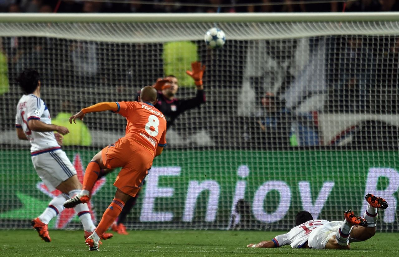 Valencia's France-born Algeria international midfielder Sofiane Feghouli (in orange) netted the only goal of the Group H match at the Gerland stadium in Lyon. 