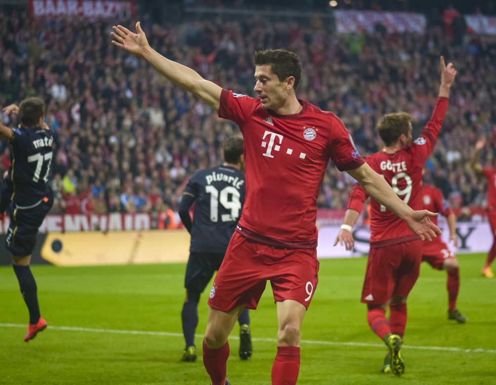 Bayern Munich's unstoppable Poland striker Robert Lewandowski celebrates after his second of three goals during the Group F clash, taking his tally to 10 from his last three games.