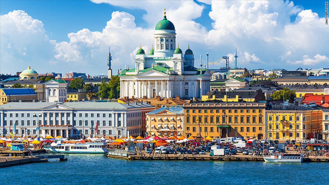 Crowds gather at a popular waterfront area in Helsinki, Finland.