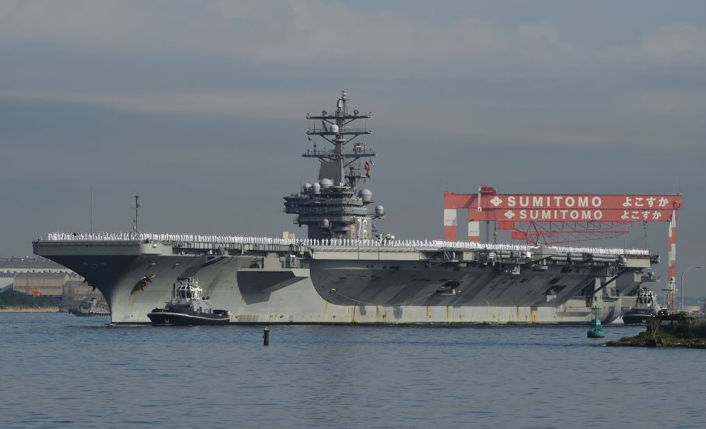 The Nimitz-class aircraft carrier USS Ronald Reagan (CVN 76) arrives at the U.S. Navy base in Yokosuka, a suburb of Tokyo, Japan, on October 1, 2015. The Reagan is the fifth U.S. carrier forward deployed to Japan following USS George Washington (CVN 73), USS Kitty Hawk (CV 63), USS Independence (CV 62) and USS Midway (CV 41), according to the Navy. 