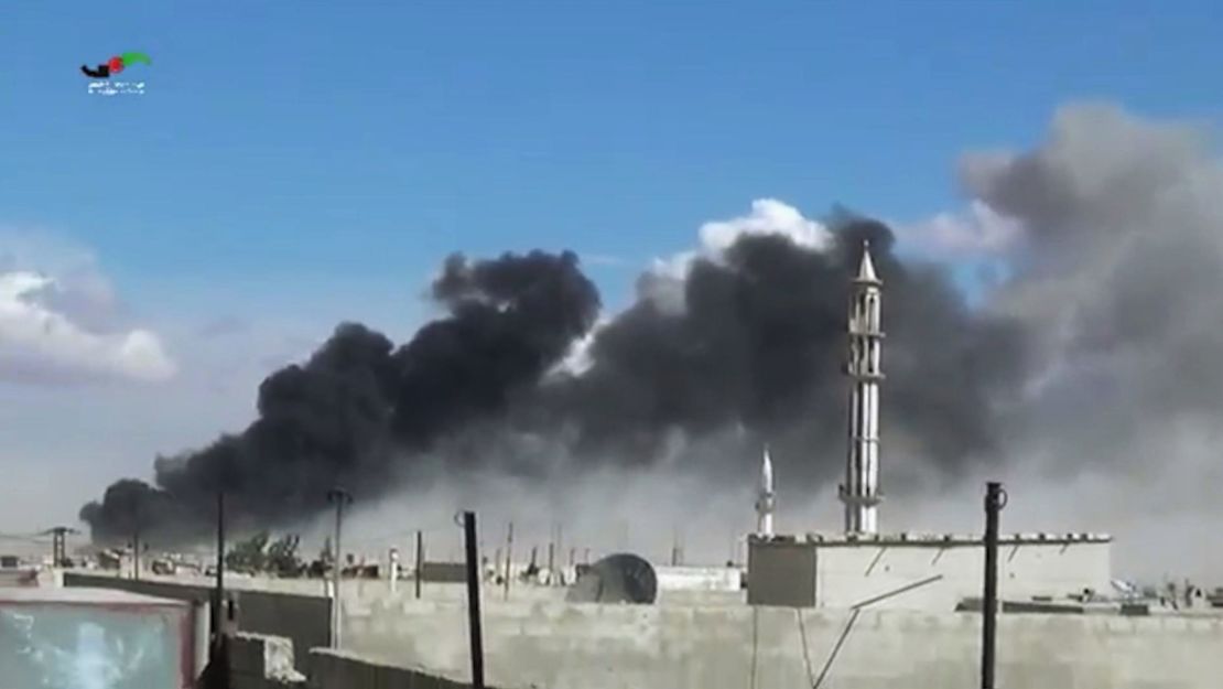 Smoke rises after airstrikes by Russian jets in Talbiseh, western Syria, on September 30, 2015.