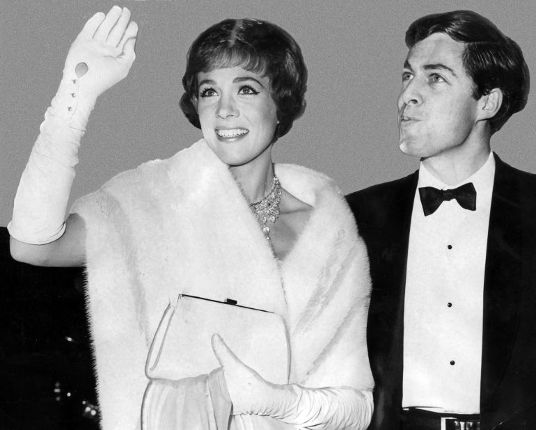 Andrews arrives at the Oscars with her husband, Tony Walton, in 1965. She would leave the ceremony with the Best Actress award for her role in "Mary Poppins."