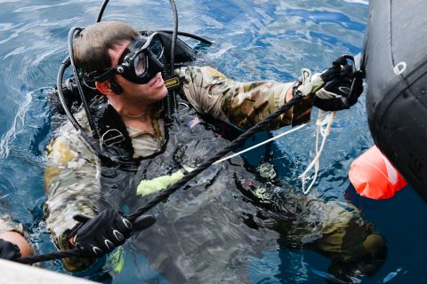 <strong>9. They often participate in team sports such as water polo, wrestling or football</strong><br /><br />Pictured is a U.S. Air Force Combat Control airman from the 320th Special Tactics Squadron, Kadena Air Base, preparing to submerge during an amphibious operations exercise in September 2015 off the  coast of Okinawa, Japan.