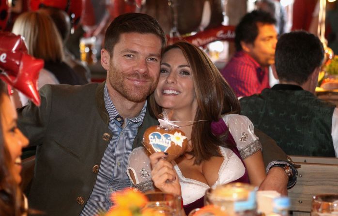 He's won the Champions League with both Liverpool and Real Madrid as well as league titles with the Spanish club and Bayern. The move to Bayern also gave the midfielder the opportunity to expand his wardrobe. The beaming Alonso is pictured with his wife Nagore Aramburo.