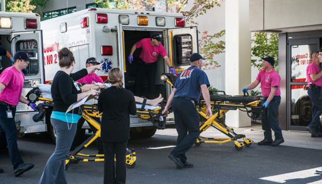 A patient is wheeled into the emergency room at Mercy Medical Center in Roseburg on October 1.