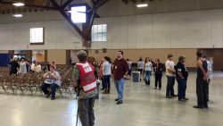 People gather at the fairgrounds on October 1.