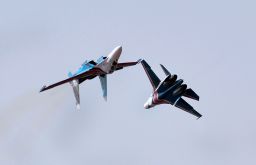 The Russian Knights aerobatic demonstration team fly in their Sukhoi SU-27s on February 9, 2013.