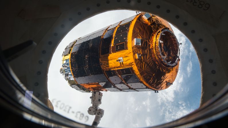 A robotic arm on the International Space Station prepares to release a Japanese cargo vehicle on Monday, September 28. The vehicle had delivered almost 5 tons of hardware and supplies a few weeks ago.