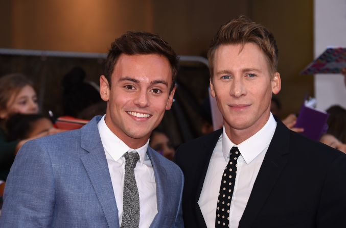 Olympic diver Tom Daley, left, and screenwriter Dustin Lance Black <a href="index.php?page=&url=http%3A%2F%2Fwww.dailymail.co.uk%2Ftvshowbiz%2Farticle-3257363%2FHe-said-yes-said-yes-Tom-Daley-gushes-fiance-Dustin-Lance-Black-shares-heartfelt-photo-diamond-engagement-rings.html" target="_blank" target="_blank">flashed their engagement rings</a> at the Pride of Britain awards in September in London. Daley <a href="index.php?page=&url=https%3A%2F%2Finstagram.com%2Fp%2F8U47g0r-tH%2F%3Ftaken-by%3Dtomdaley1994" target="_blank" target="_blank">confirmed their engagement this week via his Instagram account. </a>