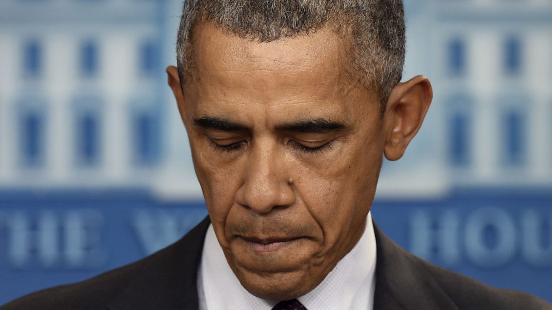 Obama pauses on October 1 during a news conference about the mass shooting at Umpqua Community College in Oregon.