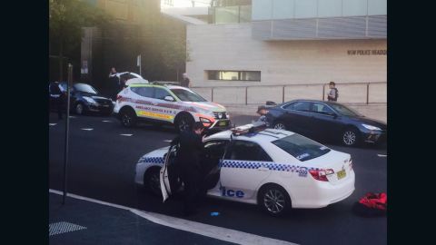 Authorities respond after a shooting outside a police headquarters near Sydney, Australia.