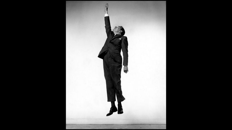 The mustachioed Thomas E. Dewey was governor of New York and twice the Republican candidate for President, but he was derided as "the little man on the wedding cake" by critics. Though described as "humorless" by observers, his pose for Halsman seems surprisingly lighthearted.