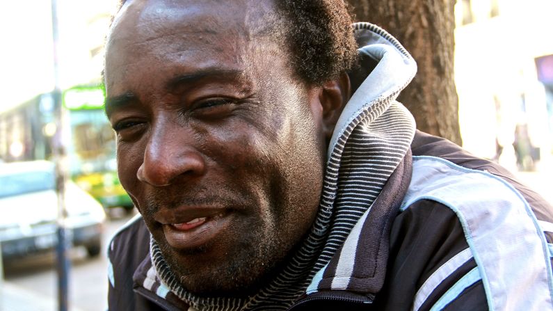 As expressed on this Congolese immigrant's face, Fernet tastes terrible to the unseasoned drinker. But many people are soon won over. 