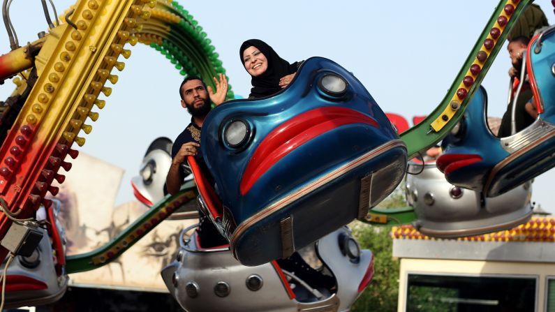 Eid al-Adha was celebrated by Muslims worldwide on September 22 and 23. Here, revelers in Baghdad enjoy an amusement park. 