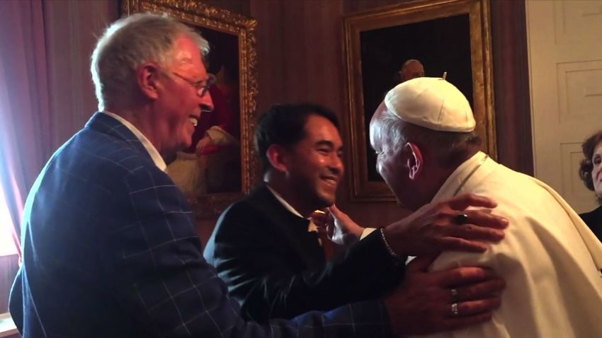 Pope Francis meets hugs same sex couple_00000803.jpg