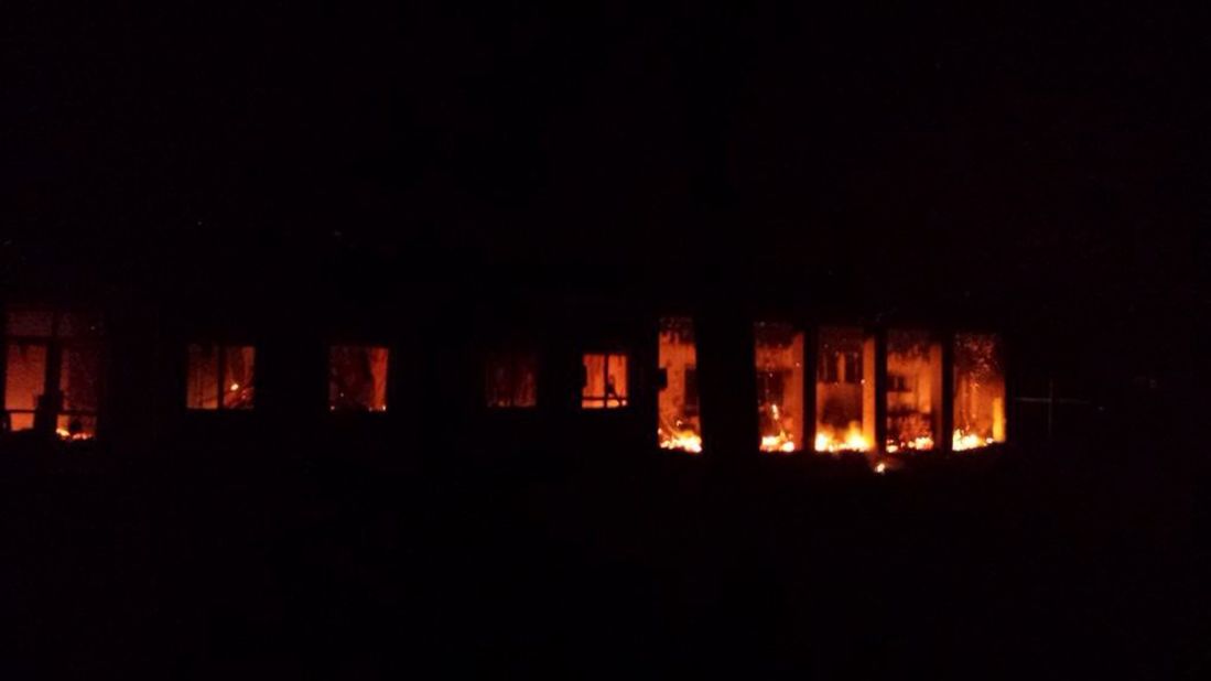 Flames are visible inside a Doctors Without Borders hospital in Kunduz, Afghanistan, after a U.S. airstrike on Saturday, October 3. At least 30 people died in the attack, the charity said in its internal review of the strike released Thursday, November 5. The commander of U.S. forces in Afghanistan has said the hospital was hit accidentally.