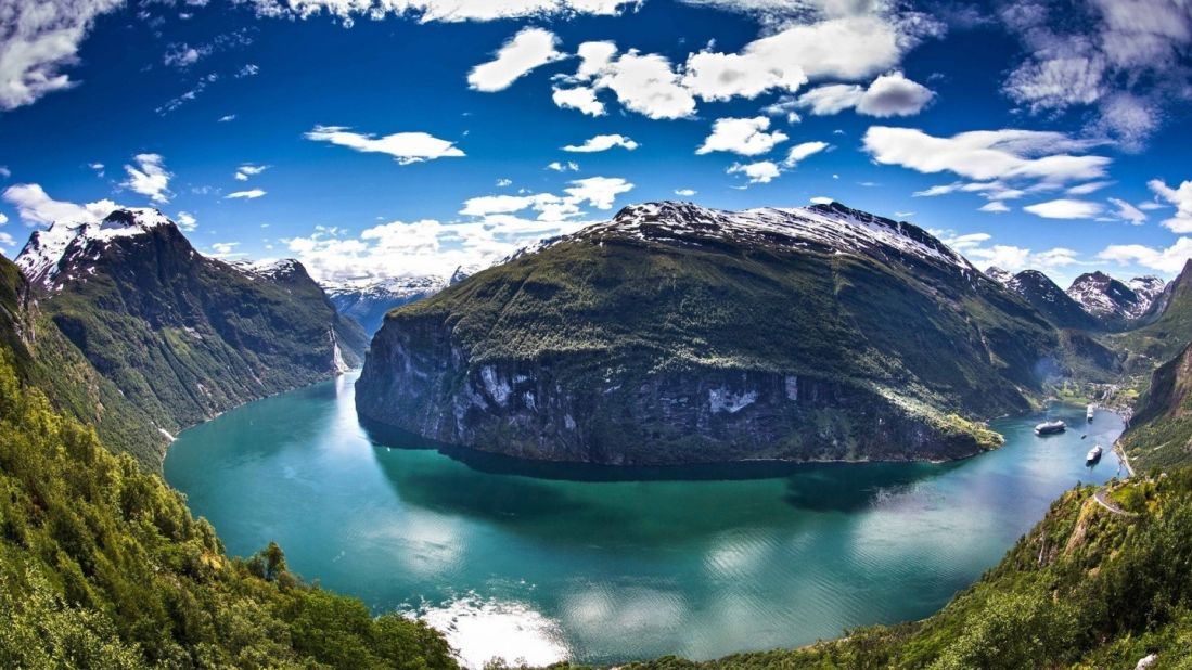 Norway's Geirangerfjord is located in More og Romsdal, in the southwestern part of the county. Cruisers heading into this port get excellent views of its deep blue water, snow-covered peaks, waterfalls and forests. "It seems like everything is blooming," says Captain Espen Been of Royal Caribbean's Grandeur of the Seas. 