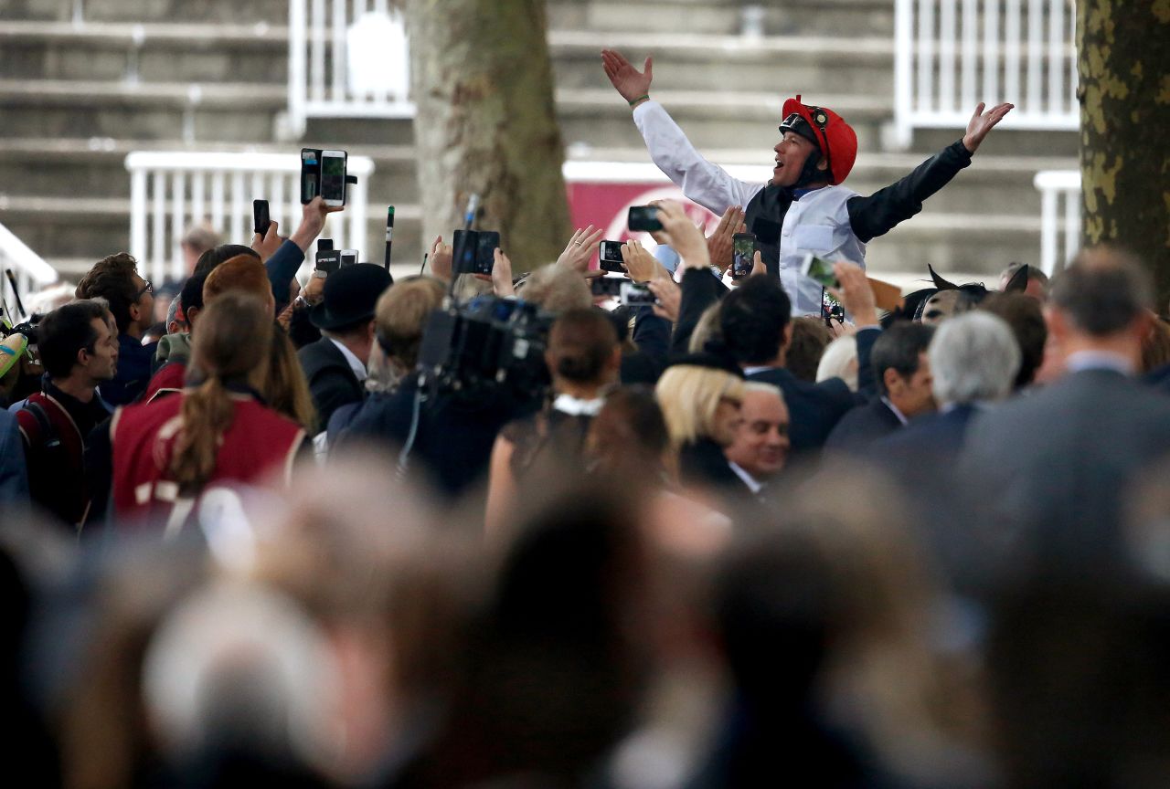 The 44-year-old Dettori savors his fourth victory in the Arc.