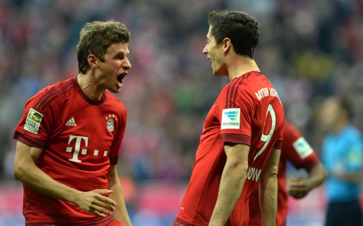 Thomas Mueller and Robert Lewandowski both scored twice as Bayern Munich beats Borussia Dortmund 5-1 at the Allianz Arena.