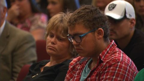 Mathew Downing attends a recent church service in Roseburg, Oregon.