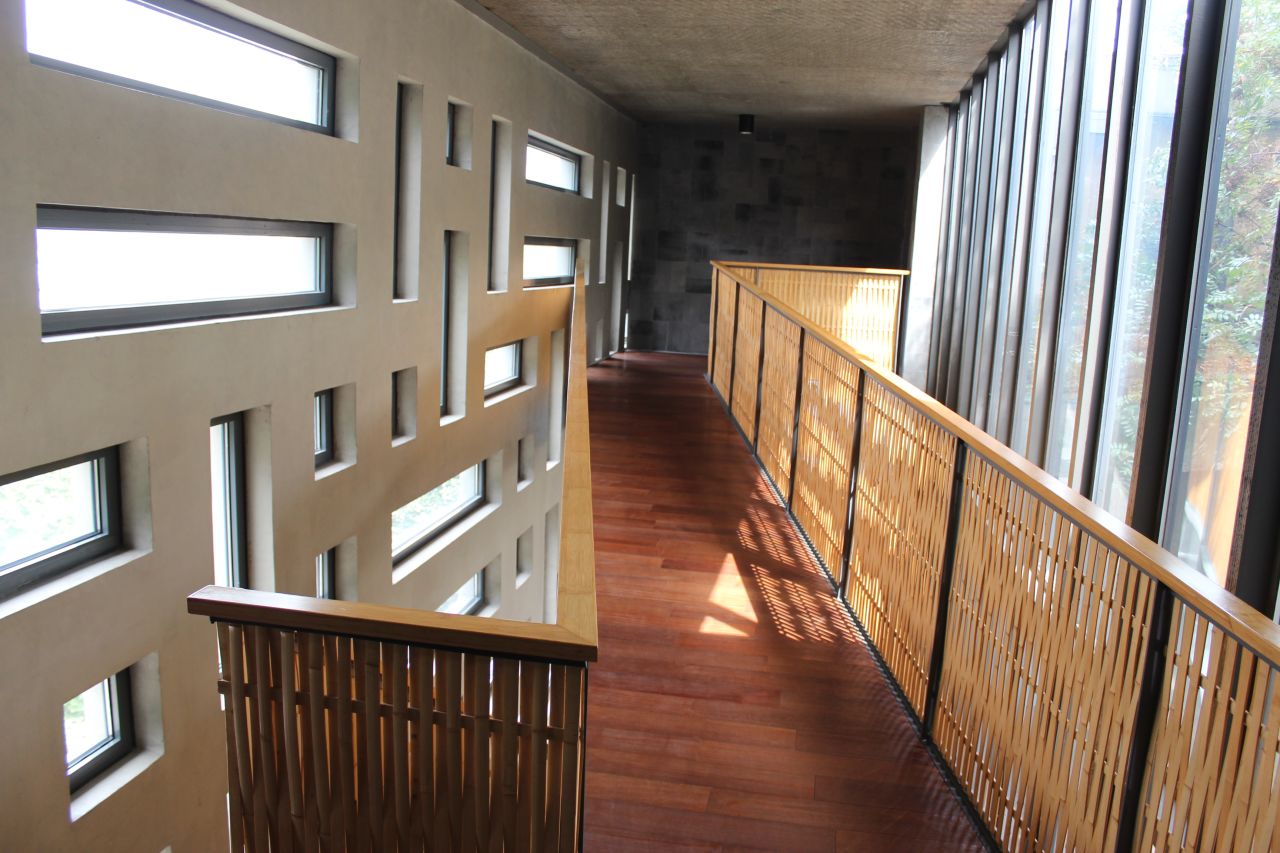 The interior of San-He Residence. The complex comprises a three-walled building with one side open to the outside.