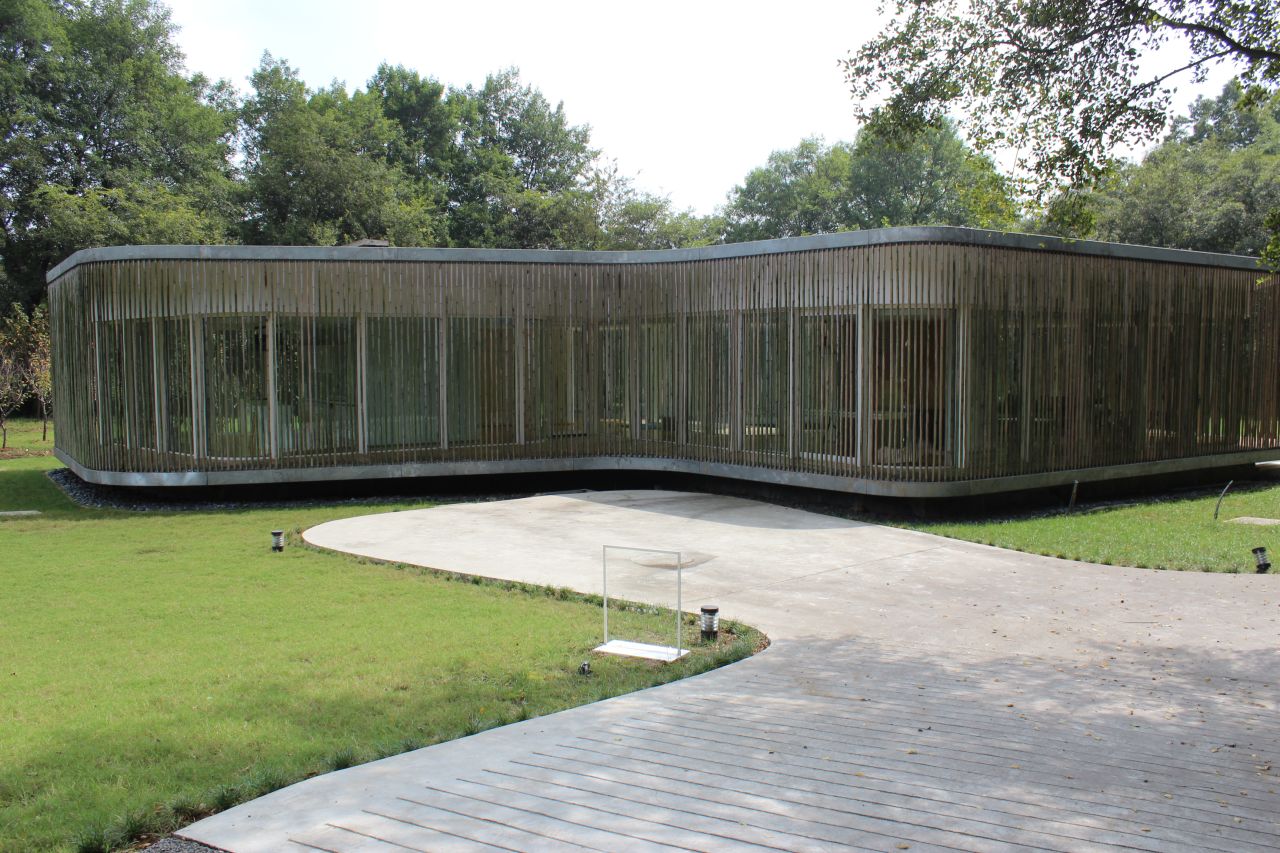 This house by Spanish architects Luis M Mansilla and Emilio Tunon creates the illusion of being outside in a forest clearing while indoors.