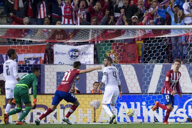 Luciano Vietto celebrates after scoring Atletico Madrid's equalizer in the 1-1 draw against Real Madrid.