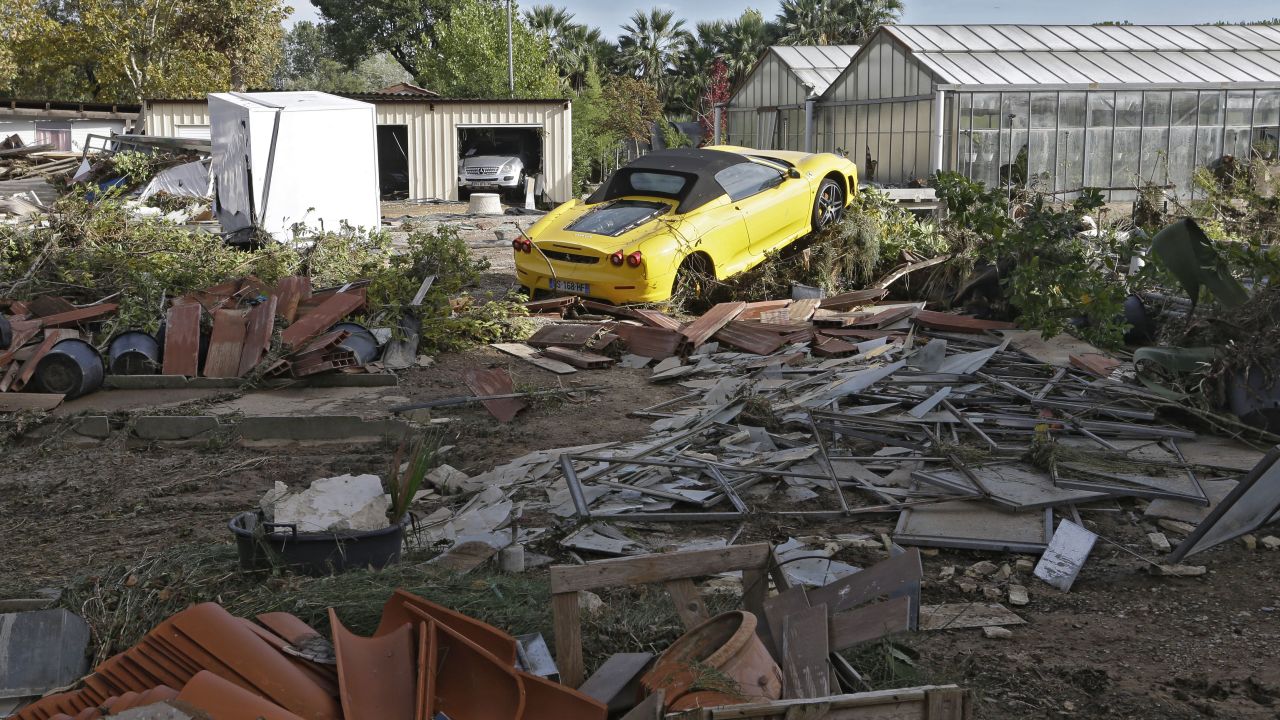 A Ferrari is seen in the middle of debris near Cannes, France, on October 4.