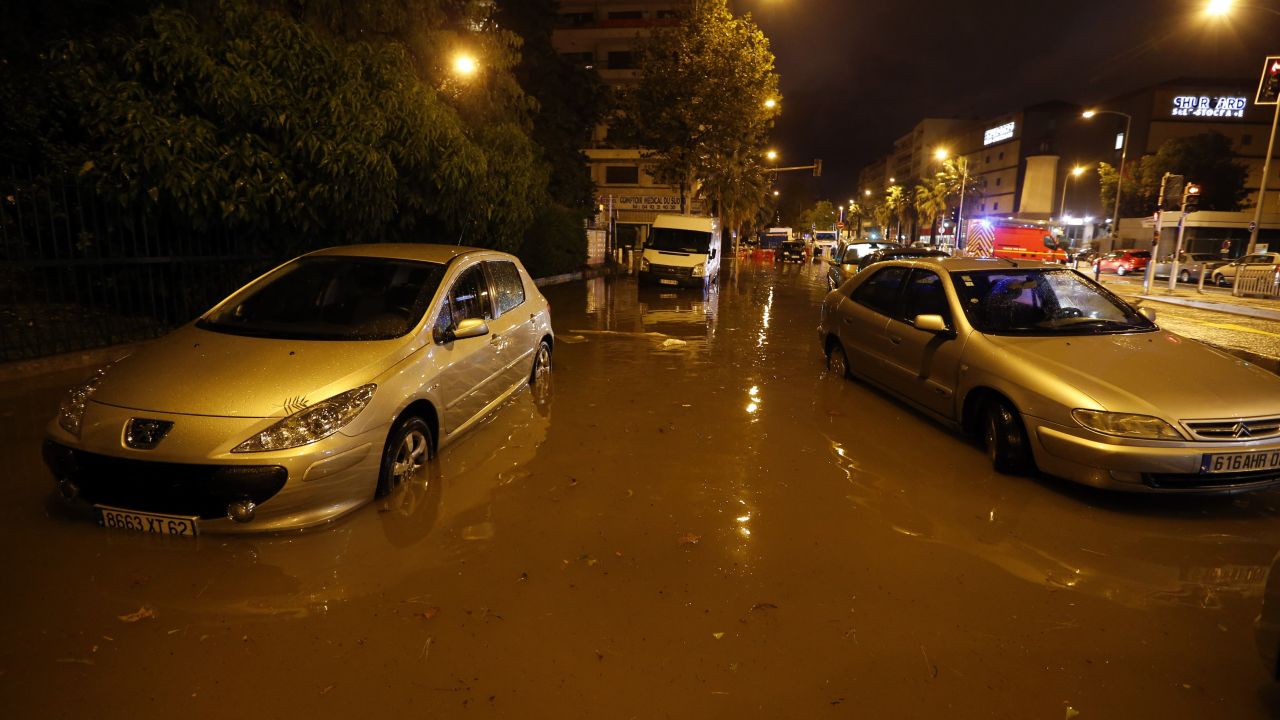 Cars are parked on a flooded street in Nice, France, on Saturday, October 3.