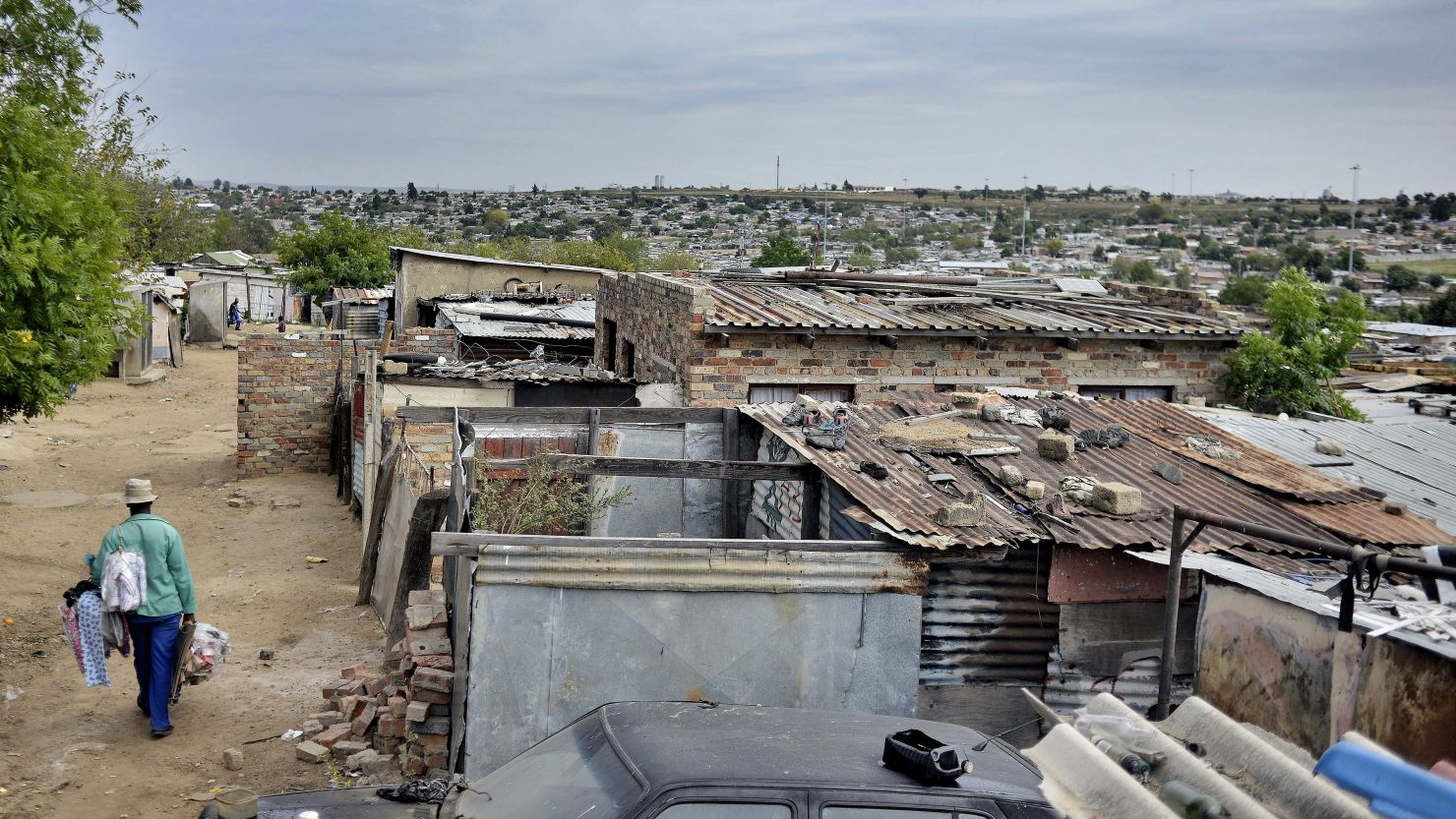 How can we tackle inequality in impoverished areas like the Diepsloot township outside Johannesburg?