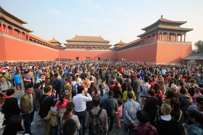 Tourists visit the Forbidden City on October 4, 2015 in Beijing, China. More 750 million Chinese people were expected to take a trip for the National Day holiday, known as Golden Week, from October 1 to October 7. Here's what half a country on the move looks like. 