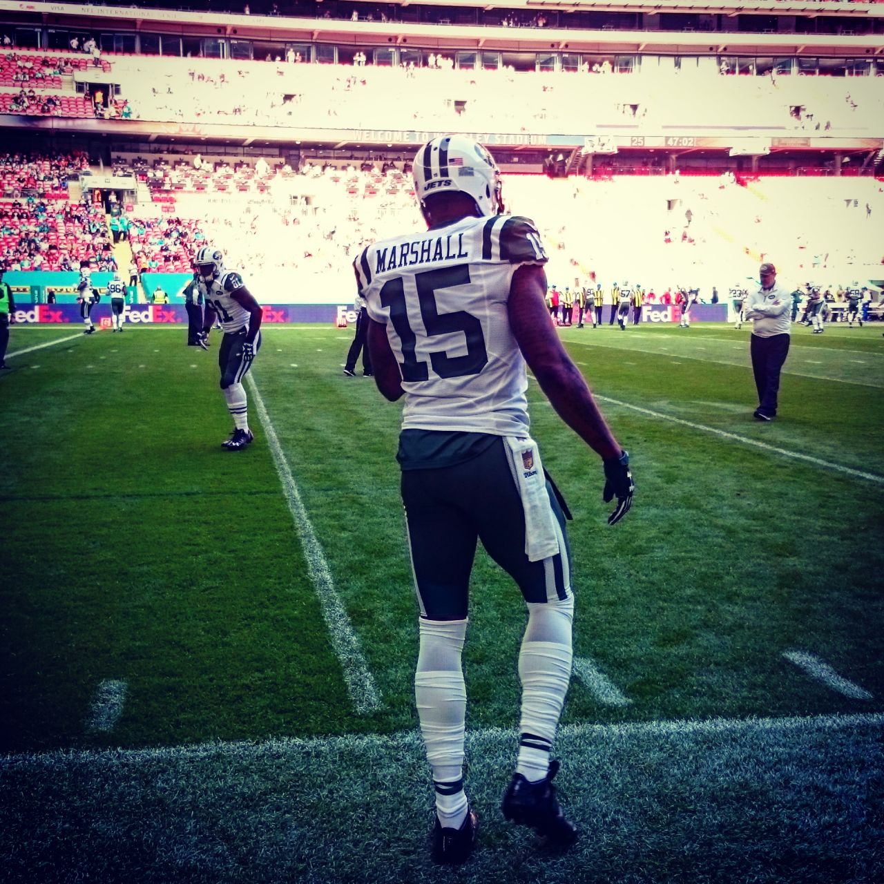 New York Jets wide receiver Brandon Marshall warms up on the Wembley pitch prior to his team's clash against the Miami Dolphins.
